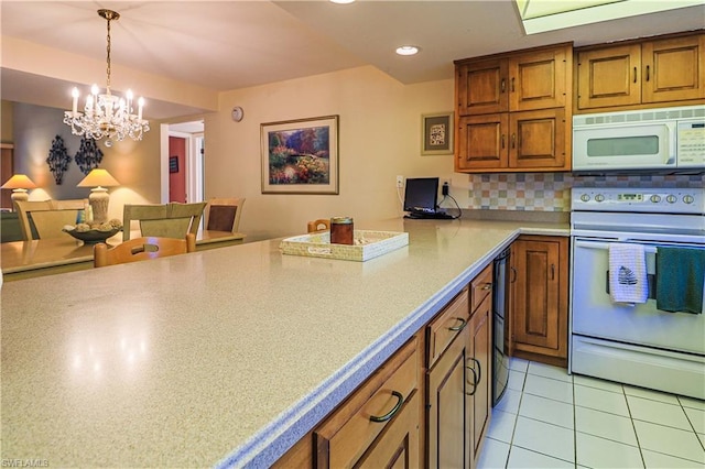 kitchen featuring white appliances, light tile floors, a chandelier, tasteful backsplash, and decorative light fixtures