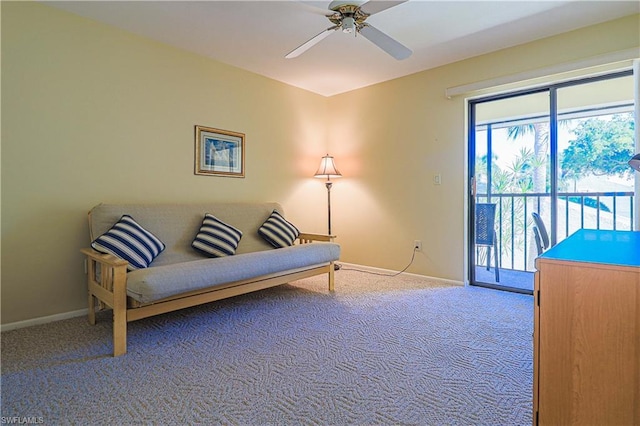 sitting room with plenty of natural light, carpet flooring, and ceiling fan