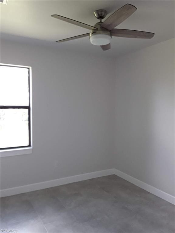 unfurnished room with ceiling fan