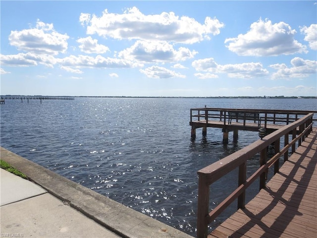 dock area featuring a water view