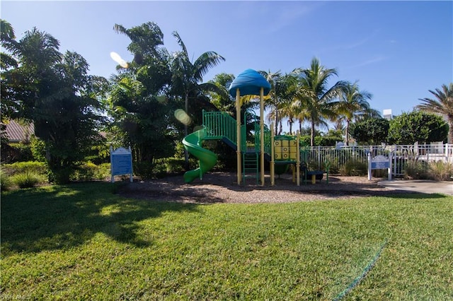 view of jungle gym featuring a yard