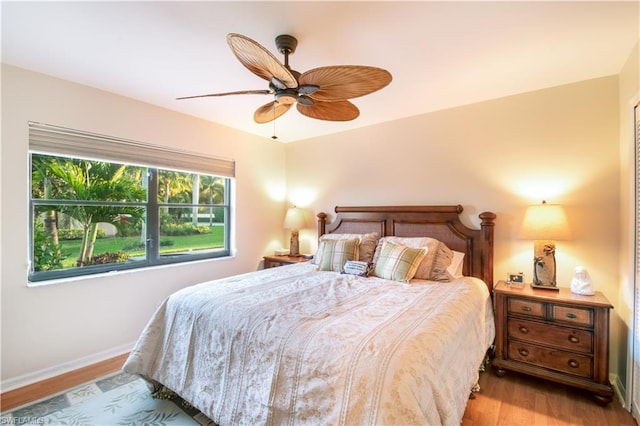 bedroom featuring ceiling fan and light wood-type flooring