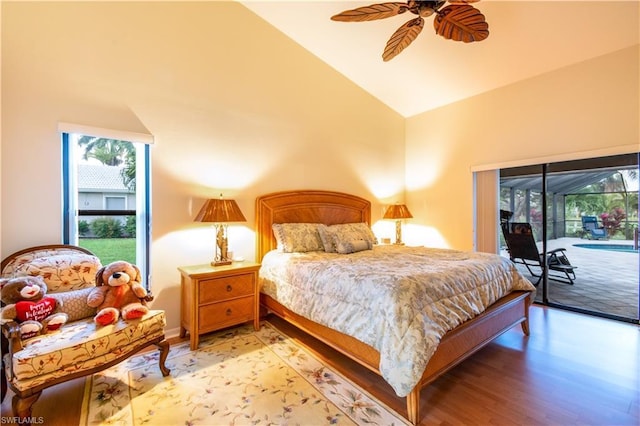 bedroom with ceiling fan, access to exterior, vaulted ceiling, and light wood-type flooring