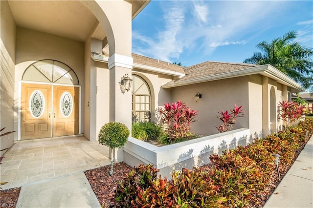 doorway to property featuring french doors