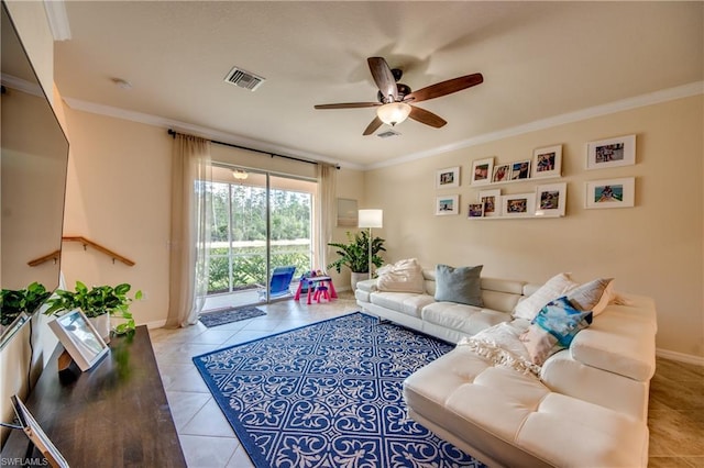 tiled living room with crown molding and ceiling fan