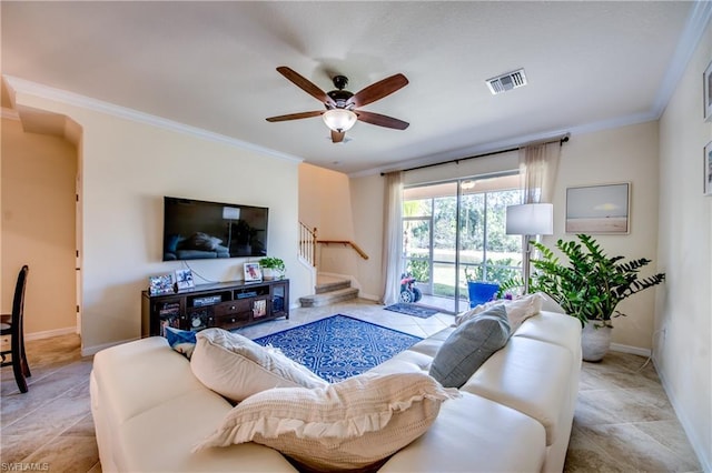 tiled living room featuring crown molding and ceiling fan