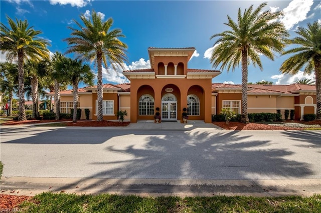 mediterranean / spanish house with french doors