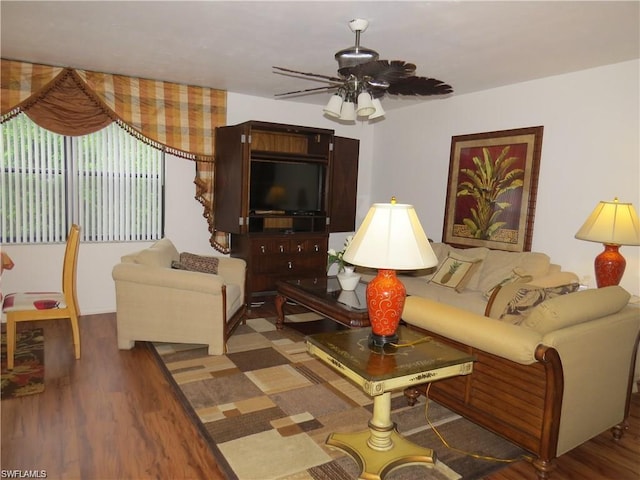 living room with hardwood / wood-style floors and ceiling fan