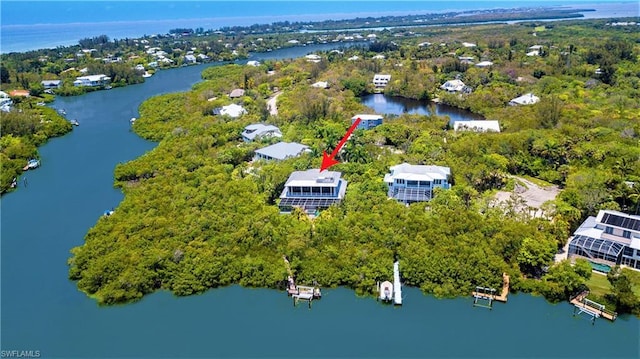 aerial view featuring a water view