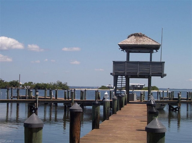 dock area featuring a water view