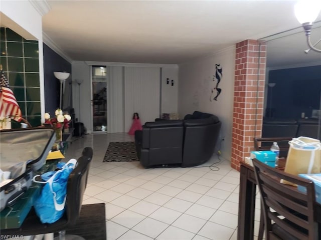 living room featuring light tile floors, brick wall, and crown molding