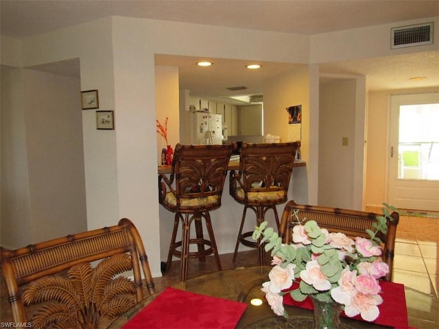 view of tiled dining space