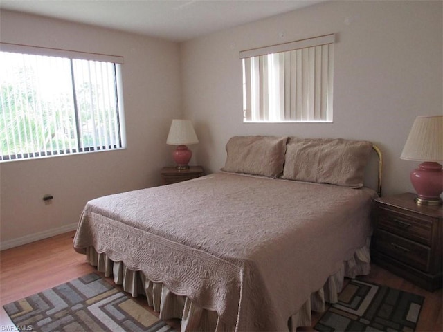 bedroom featuring hardwood / wood-style floors