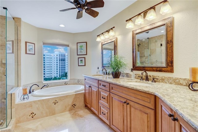 bathroom featuring shower with separate bathtub, ceiling fan, dual sinks, tile flooring, and large vanity