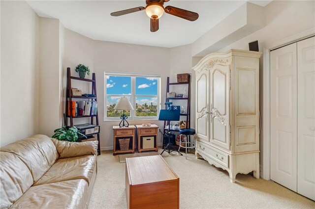 home office with light colored carpet and ceiling fan