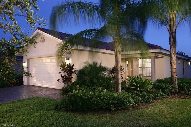 view of front of home featuring a garage