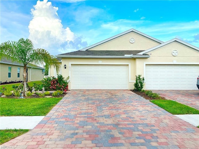 ranch-style house featuring a garage