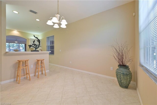 interior space with a chandelier