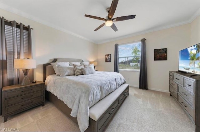 bedroom with light colored carpet, ornamental molding, and ceiling fan