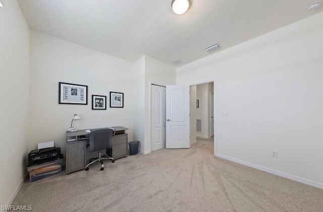 office space with light colored carpet