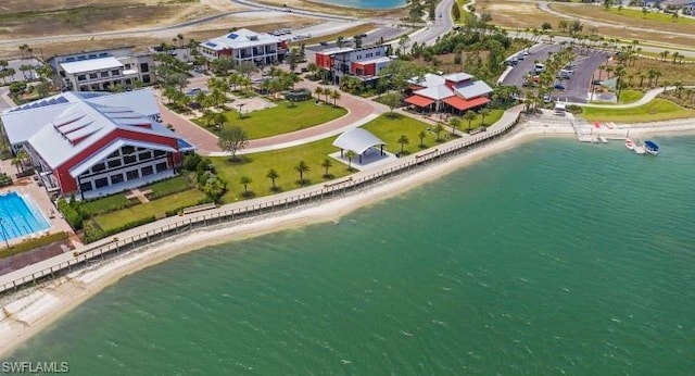 aerial view featuring a view of the beach and a water view