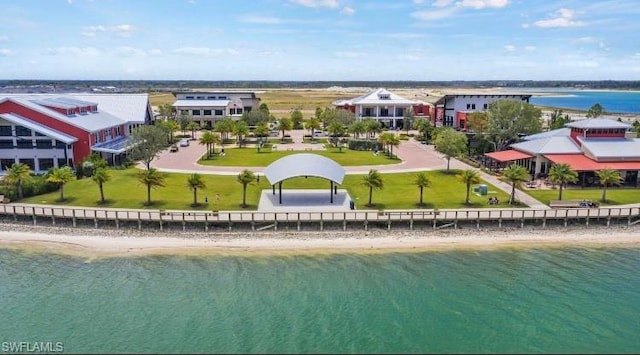 bird's eye view with a beach view and a water view