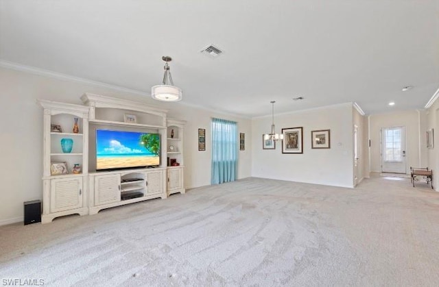 unfurnished living room featuring crown molding, an inviting chandelier, and light carpet