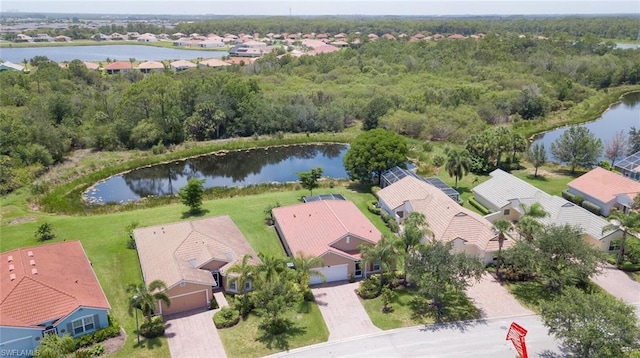 birds eye view of property featuring a water view