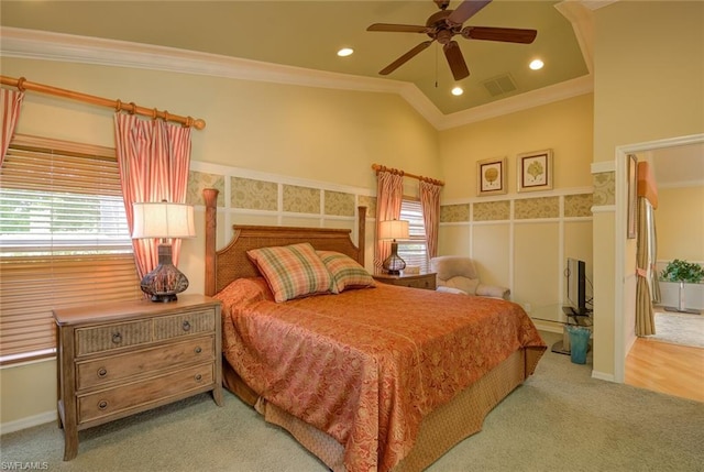 bedroom with multiple windows, ceiling fan, and ornamental molding