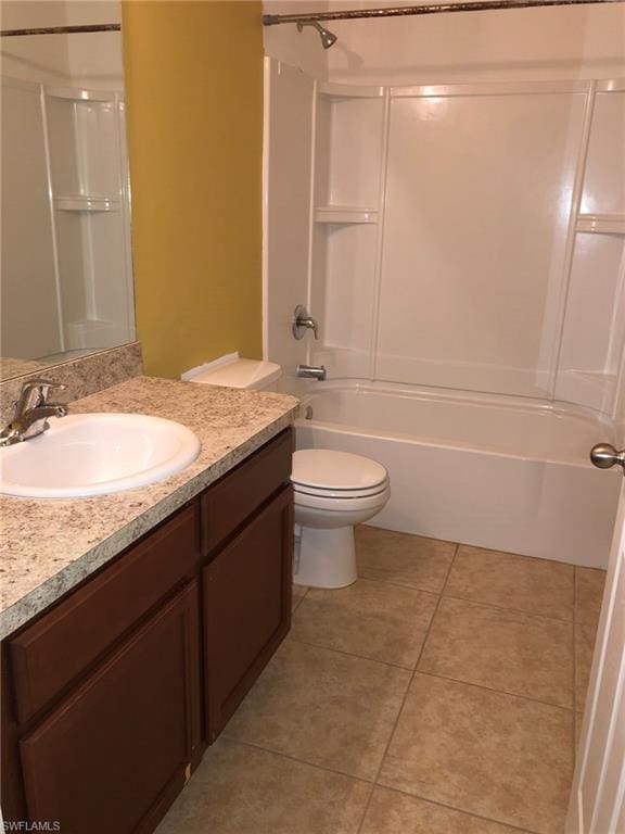 full bathroom with vanity, tile flooring, shower / bathing tub combination, and toilet