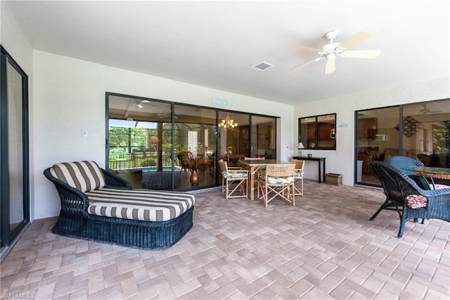 view of patio with ceiling fan