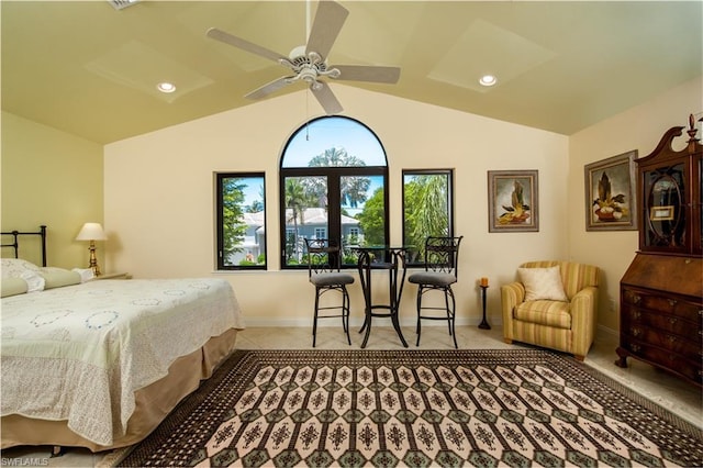 tiled bedroom with lofted ceiling and ceiling fan