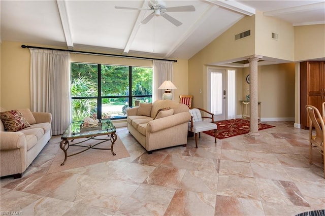 living room with light tile flooring, ceiling fan, decorative columns, and vaulted ceiling with beams