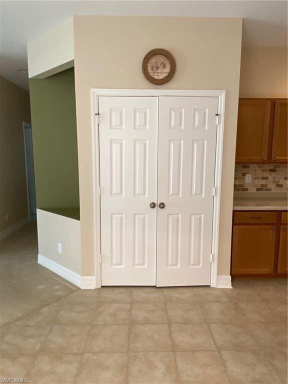 interior space featuring light tile flooring