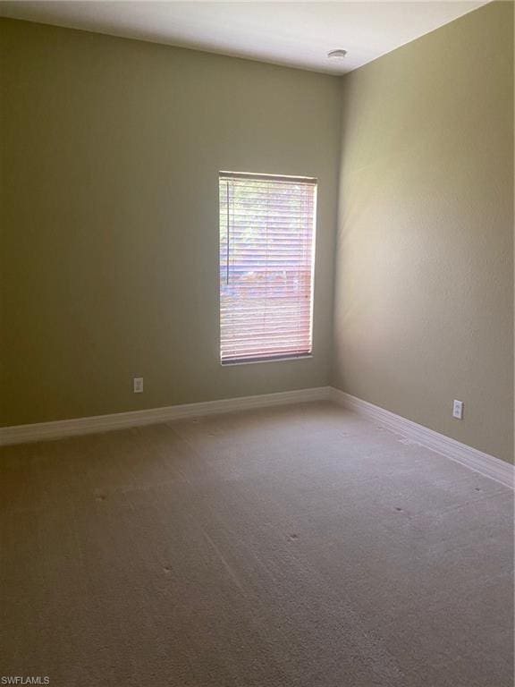 view of carpeted spare room