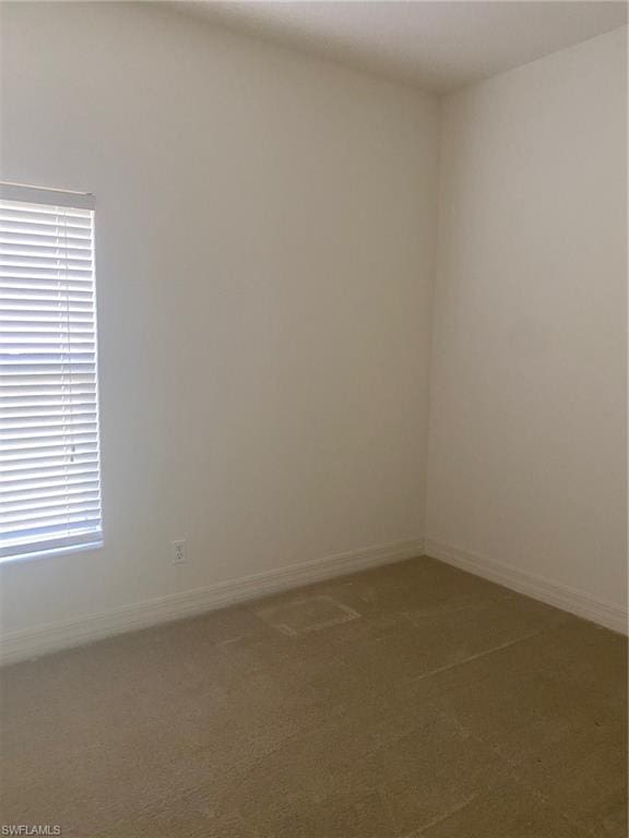 unfurnished room with carpet