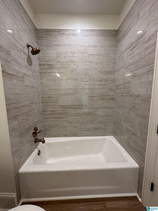 bathroom featuring ornamental molding, plenty of natural light, a shower with door, and vanity