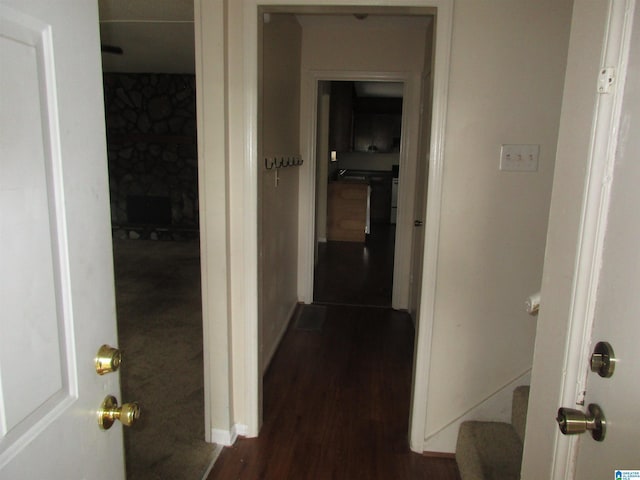 hallway featuring dark hardwood / wood-style floors