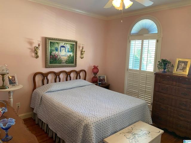 bedroom featuring ceiling fan, crown molding, and dark hardwood / wood-style flooring