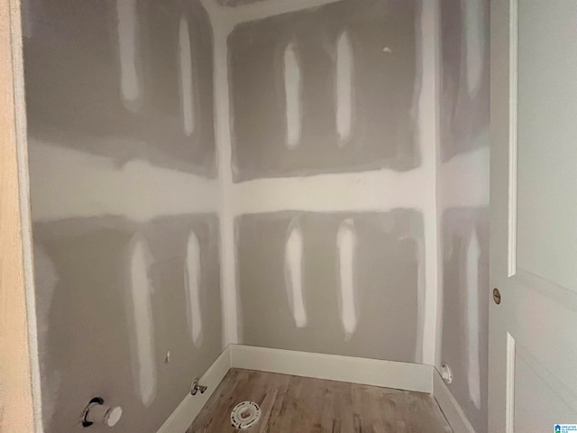 laundry room featuring hardwood / wood-style flooring