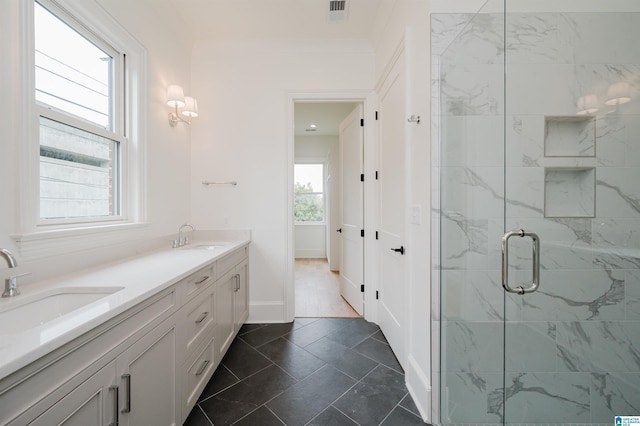 bathroom featuring vanity and walk in shower