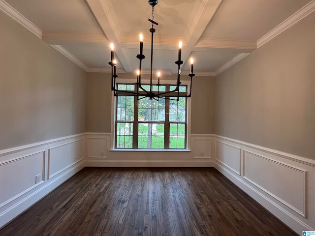 unfurnished dining area featuring coffered ceiling, dark hardwood / wood-style flooring, crown molding, and an inviting chandelier