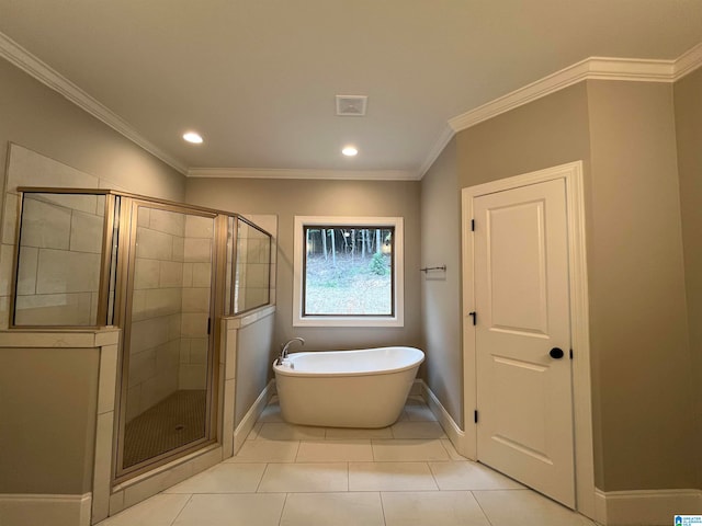 bathroom with tile patterned flooring, independent shower and bath, and ornamental molding