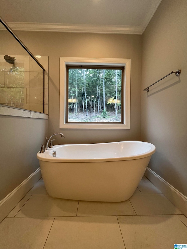 bathroom featuring separate shower and tub, tile patterned floors, and ornamental molding