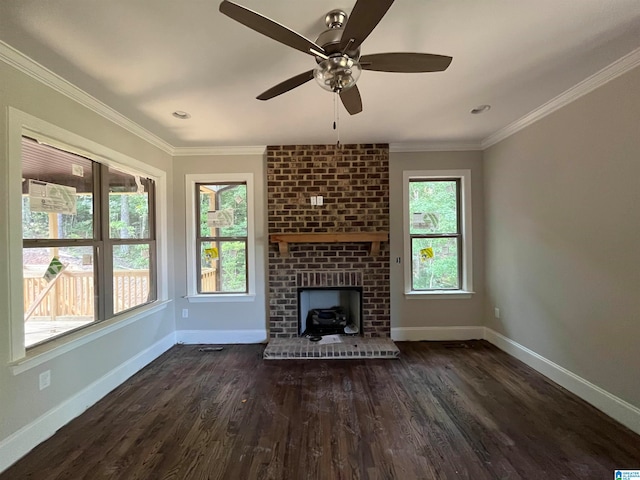 unfurnished living room with a fireplace, ceiling fan, dark hardwood / wood-style flooring, and crown molding