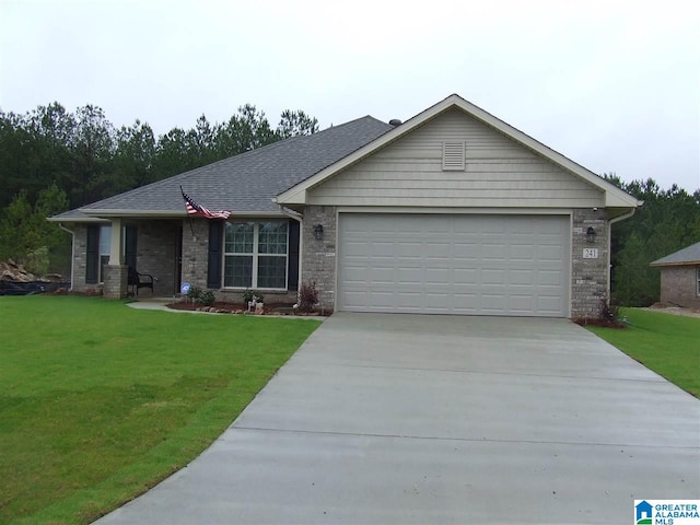 ranch-style home featuring a garage and a front lawn