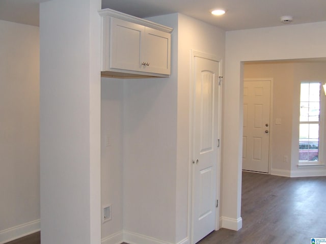 interior space with dark wood-type flooring