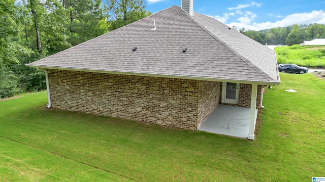 view of home's exterior featuring a yard