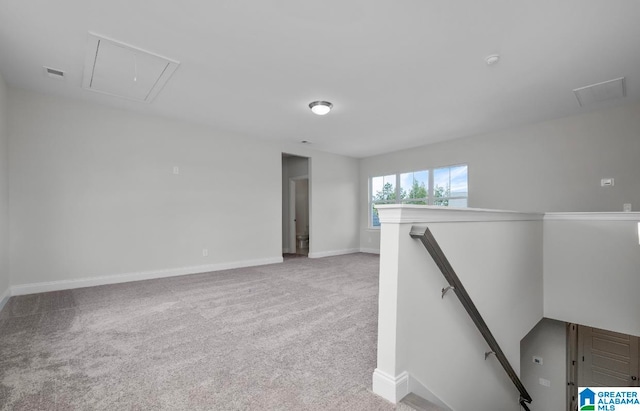 spare room featuring carpet floors