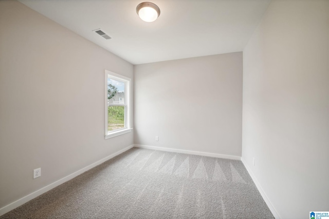 view of carpeted spare room